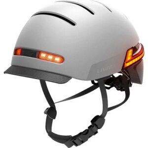 Grauer Fahrradhelm mit integrierter LED-Beleuchtung und verstellbarem Kinnriemen.